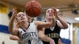 Old Tappan's Jackie Kelly #4 grabs a rebound in front
