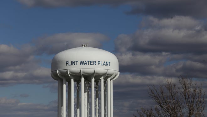 The water tower of the Flint Water Treatment Plant is seen on Monday, March 21, 2016.