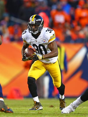 Jan 17, 2016; Denver, CO, USA; Pittsburgh Steelers running back Jordan Todman (30) against the Denver Broncos during the AFC Divisional round playoff game at Sports Authority Field at Mile High. Mandatory Credit: Mark J. Rebilas-USA TODAY Sports
