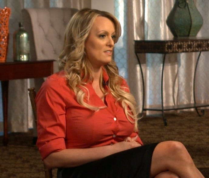 This image released by CBS News shows Stormy Daniels, left, during an interview with Anderson Cooper which will air on March 25, 2018, on 
