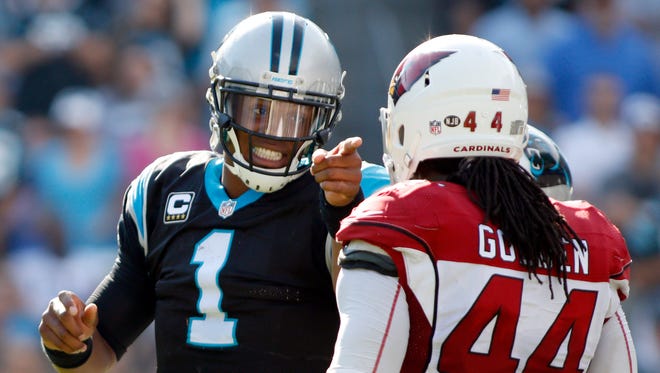 Carolina Panthers' Cam Newton (1) objects to a late hit by Arizona Cardinals' Markus Golden (44) in the second half of an NFL football game in Charlotte, N.C., Sunday, Oct. 30, 2016.