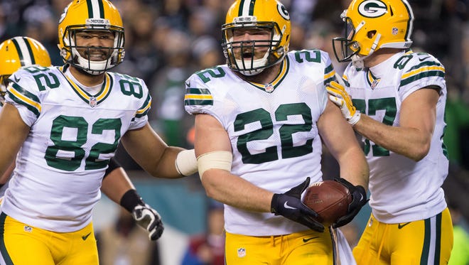 Green Bay Packers fullback Aaron Ripkowski (22) reacts with tight end Richard Rodgers (82) and wide receiver Jordy Nelson (87) after his touchdown run against the Philadelphia Eagles during the second half at Lincoln Financial Field. The Green Bay Packers won 27-13.