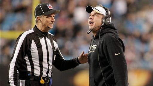 New Orleans Saints head coach Sean Payton speaks to an official after Carolina Panthers scored a touchdown in the second half of a game earlier this season.