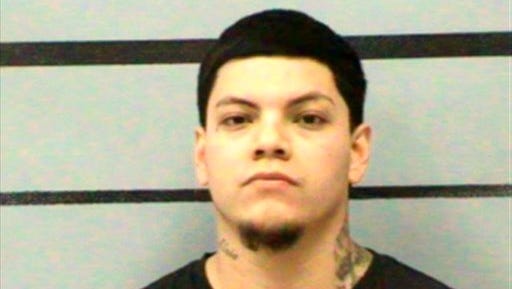 This undated photo provided by the Lubbock County Sheriff's Office shows Adrian Vicente Castillo. Police say the 23-year-old man arrested Tuesday, April 4, 2017, is their suspect in the shootings of several people at a West Texas motel. Lubbock police say Castillo was booked Tuesday evening into the Lubbock County Jail on a charge of aggravated assault with a deadly weapon. (Lubbock County Sheriff's Office via AP)