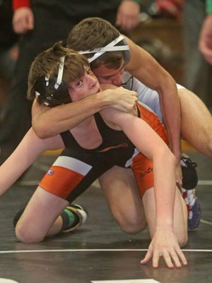 Jay Martins of Harrison defeated Thomas Barsuch of Croton 8-4 in the 106 pound final at the Westchester County Classic Wrestling Championship at Yonkers High School Jan. 25, 2015.