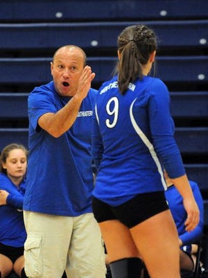 Southeastern volleyball coach Jimmy Hutton gives directions during a match against Adena last season at Adena High School. Hutton is 29-19 in two seasons with the Panthers.