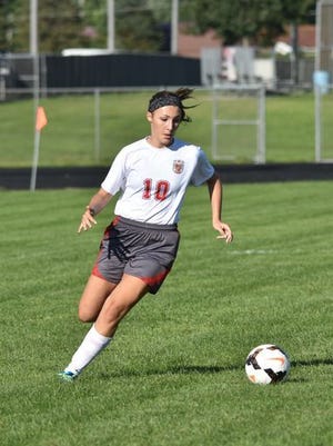 Piketon's Ally Crothers dribbles down the field during a regular season contest last year. Crothers scored a goal in the Redstreaks' 2-0 win over Northwest, Monday.