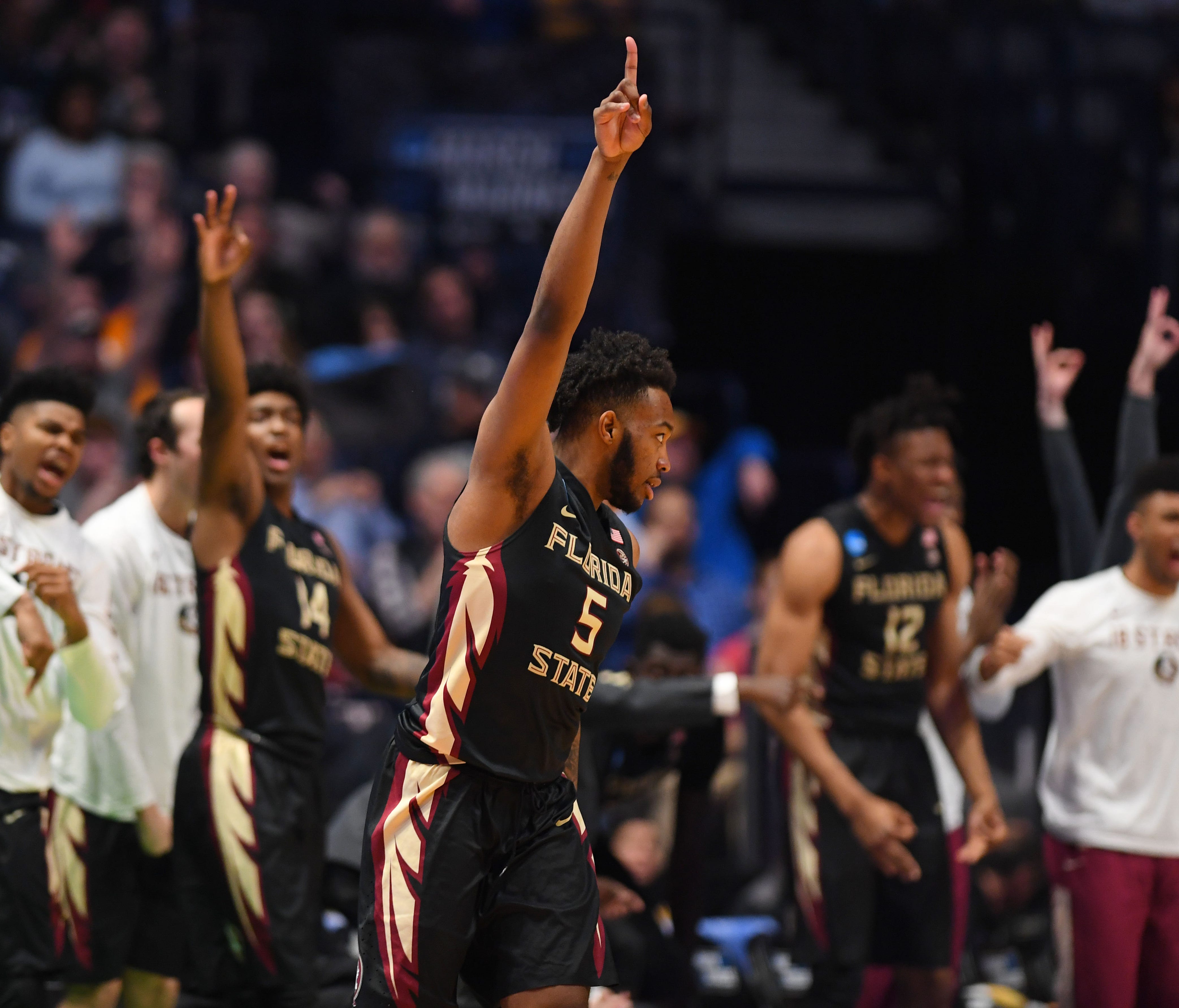 Florida State guard PJ Savoy  reacts to a play against Xavier during the second round of the 2018 NCAA tournament at Bridgestone Arena.