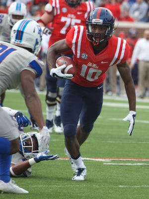 Ole Miss receiver Vince Sanders runs after making a catch during the Rebels' win against Presbyterian on Saturday.