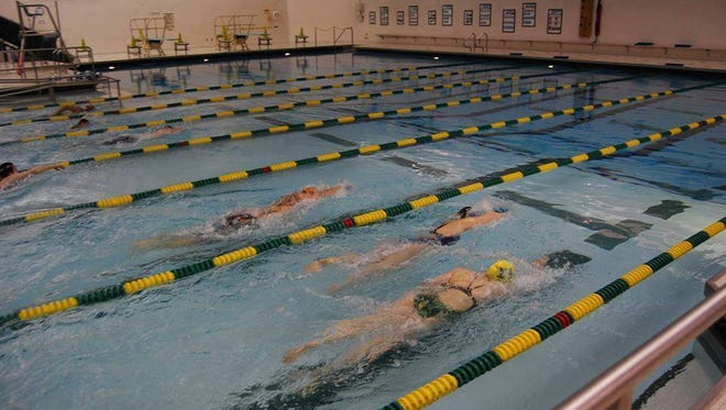 People swimming at the Howell Area Aquatic Fitness Center.