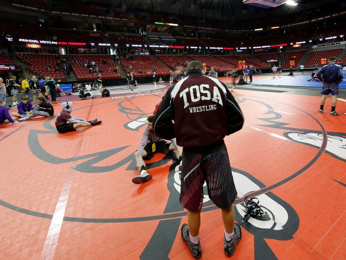 Wauwatosa's Dayton Lewis warms up before the start