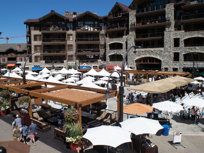 Foodies and wine lovers alike stroll through the Village