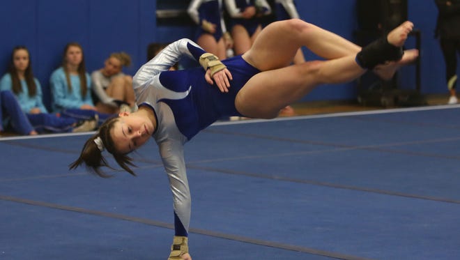 Mahopac's Callie Johanson competes in the floor exercise during the Section 1 gymnastics championship at Carmel High School Feb. 14, 2017.