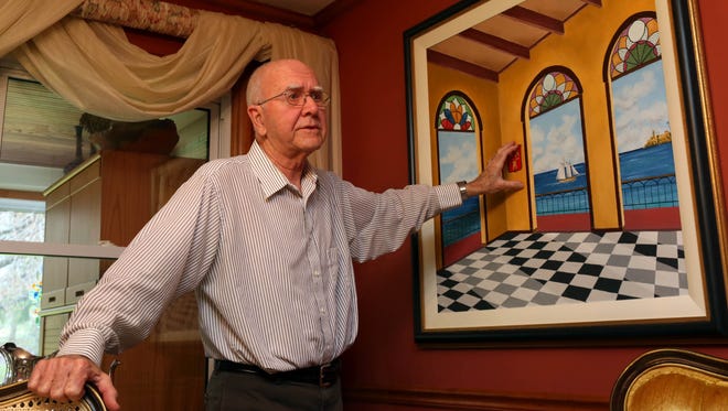 Jose Alvarez, 77, who left his native Cuba at age 23, talks about a painting he did that was inspired by memories of Cuba.