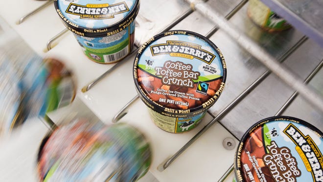 
New Ben & Jerry's “Coffee Toffee Bar Crunch” rolls off Line 1 at their factory in St. Albans.
