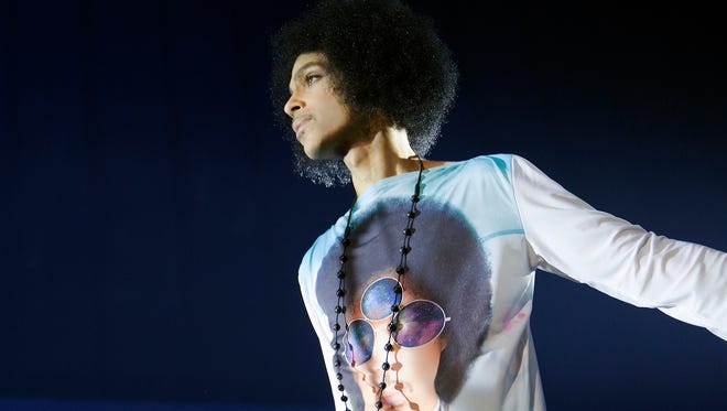 Prince, performing at Royal Farms Arena in Baltimore on May 10. He released protest song 'Baltimore' as a tribute to the slain Freddie Gray.