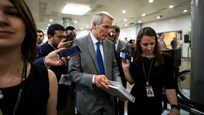 Sen. Rob Portman talks to reporters on Capitol Hill on May 17, 2017.