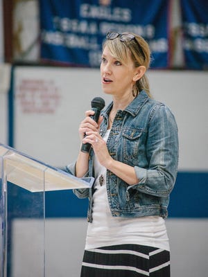 Bethany Haley Williams, the founder of Exile International, a nonprofit social work organization that aids victims of sex trafficking and child soldiers in Africa, speaks at Jackson Christian on Friday.