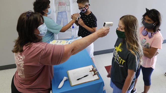 The St. Johns County School District does not currently require temperature checks, masks or desk shields, but if COVID-19 numbers continue to rise, safety measures could be instituted again.
