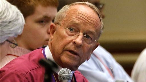 In this Thursday, June 25, 2015, photo, Gene Robinson, who in 2003 became the first Episcopal bishop living openly with a same-sex partner, attends the Episcopal General Convention in Salt Lake City. Episcopalians were set to vote Wednesday on allowing religious weddings for gay couples, just days after the U.S. Supreme Court legalized same-sex marriage nationwide.