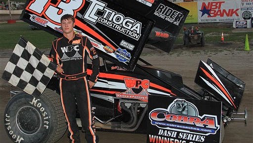 This July 5 photo provided by Empire Super Sprints, Inc., shows sprint car driver Kevin Ward Jr., in the victory lane with his car at the Fulton Speedway in Fulton, N.Y. Ward was killed Saturday at the Canandaigua Motorsports Park in Central Square, N.Y., when the car being driven by Tony Stewart struck the 20-year-old who had climbed from his crashed car and was on the darkened dirt track trying to confront Stewart following a bump one lap earlier.