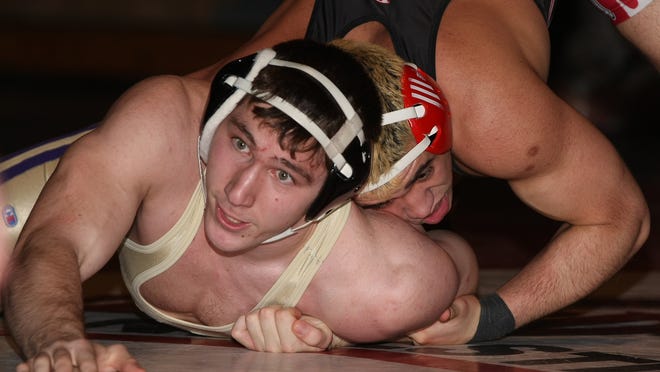 Hunterdon Central's Victor Lacombe, right, wrestles Monroe's Nicholas Goff at 220 lbs. in the Central Group V wrestling tournament final at Hunterdon Central High School in Raritan on February 13, 2015. (Photo by Keith A. Muccilli/ Special to NJ Press Media)