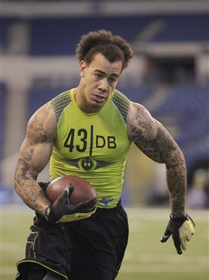 Susquehannock High School graduate Chaz Powell is shown here working out at the NFL Combine. Powell has returned to Penn State to earn his degree.