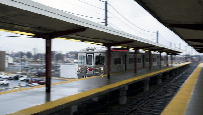 A PATCO train pulls into the Ferry Avenue station in Camden. More than 100 nonunion PATCO and DRPA workers are receiving raises. Most of them went without salary increases for 6 to 7 years.