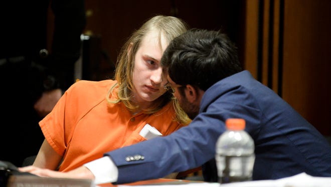 Austin F. Cooper of Willingboro, 21, left, speaks with defense attorney Jared Dorfman as he appears in court for a detention hearing Wednesday, April 18, 2018 at Burlington County Superior Court in Mount Holly, N.J. Cooper, who is charged with strict liability for an opioid-induced death of 15-year-old Madison McDonald of Marlton, will remain detained.