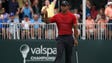 Tiger Woods reacts after making a 44 foot putt for