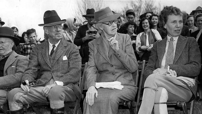 February 23, 1949 - On hand to watch the national field trials at Grand Junction, Tennessee, on Feb. 23, 1949, are Mrs. Hobart Ames (center), owner of Ames Plantation on which the trials have been run for many years, William Rogers (left), veteran follower of the trials, and his daughter, Mrs. Sue Maynard (right).