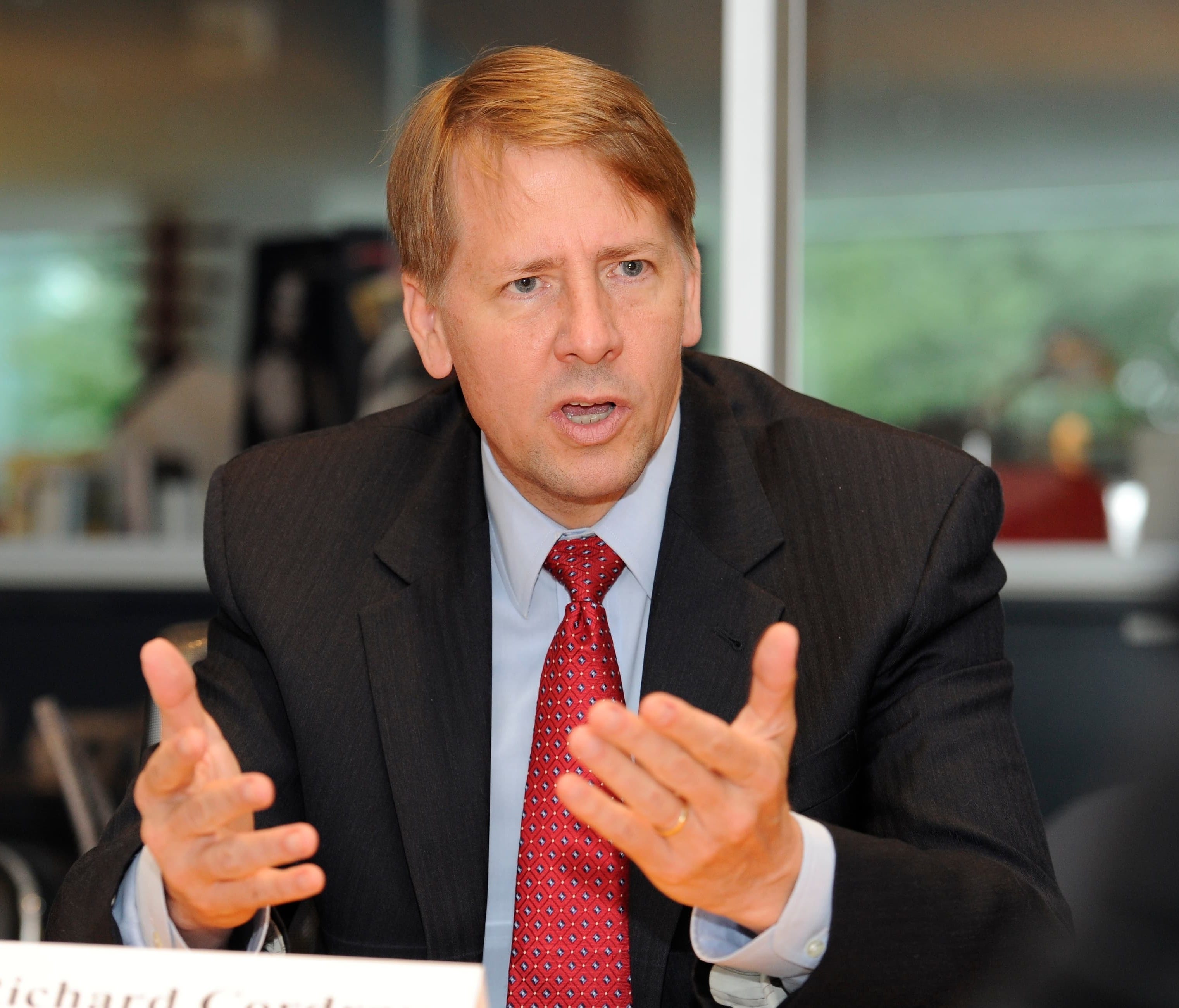 File photo taken in 2013 shows Richard Cordray, director of the Consumer FinancialProtection Bureau, speaking with the USA TODAY Editorial Board in McLean, Va.