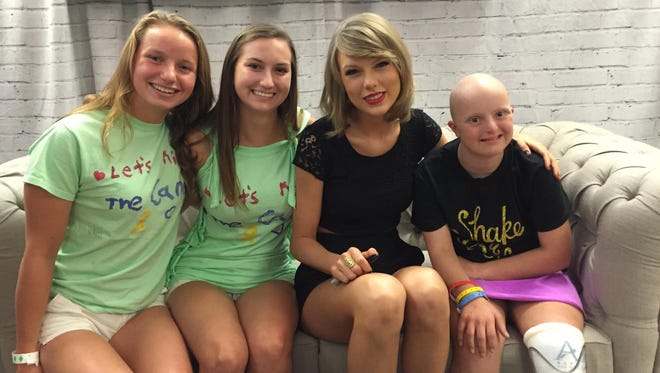 Pop star Taylor Swift meets Victoria Marsh of Middletown, with Down syndrome and cancer, before Swift's concert in Philadelphia on Saturday night.  Pictured are Victoria's sisters, Josephine Marsh, Kierstin Marsh, Taylor Swift and Victoria Marsh.