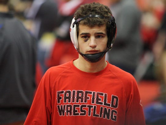 Fairfield's Zach Shupp gets ready for a 106-pound match