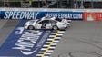 Brad Keselowski drives during a practice session, Saturday,