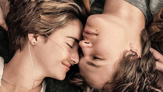 Shailene Woodley and Ansel Elgort are seen on the promotional poster for "The Fault in Our Stars."