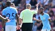 Manchester City's  Raheem Sterling gestures to referee