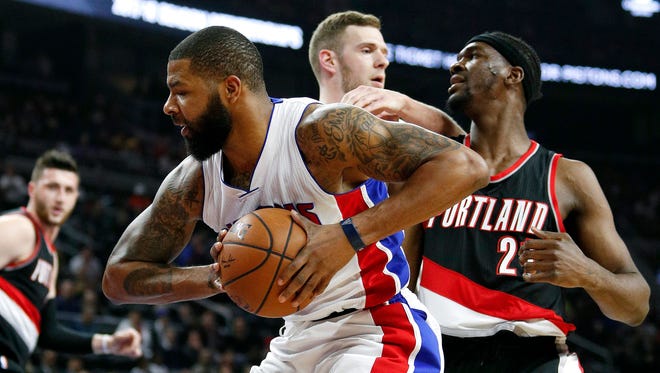 Pistons forward Marcus Morris rebounds against Trail Blazers forward Noah Vonleh during the first quarter Tuesday, Feb. 28, 2017 at the Palace.