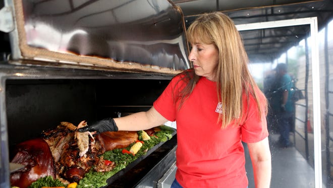 May 4, 2018 - Pitmaster and World BBQ champion Melissa Cookston pulls pork at the Memphis Barbeque Company in Southaven, MS on Friday.
