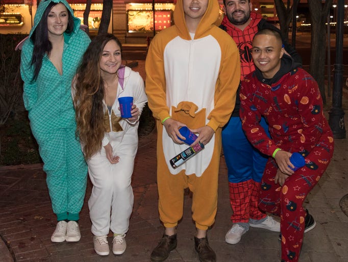 A photograph taken during the Onesie Crawl held on