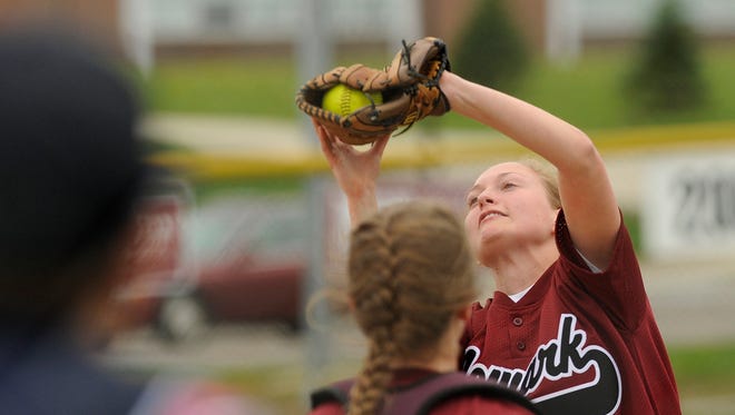Newark third baseman Mikayla Leavitt makes a catch for the out against Zanesville. Newark defeated Zanesville 10-0 in five innings on Thursday, April 21, 2016.