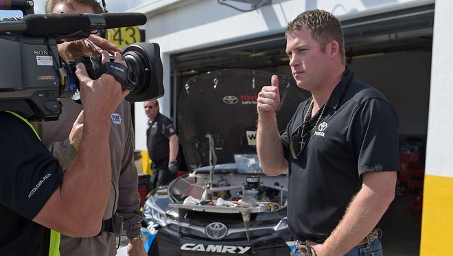 Robert Richardson Jr. gives a thumbs-up as he is interviewed before Daytona practice on Friday.