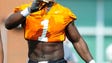 Jonathan Kongbo (1) warms up during spring training