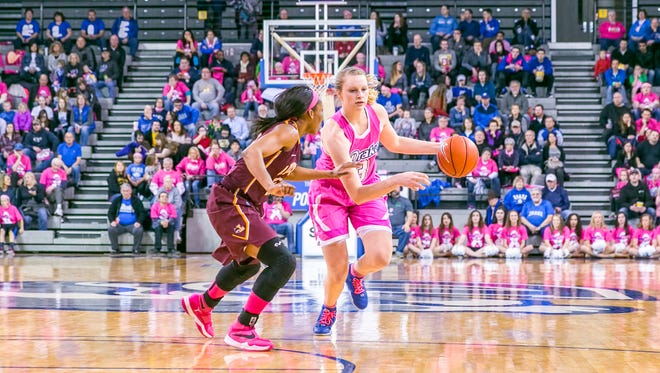 Drake's Lizzy Wendell drives to the basket during Friday's 91-61 victory over Loyola at the Knapp Center. Wendell poured in 27 points as the Bulldogs moved to 11-4 in Missouri Valley Conference play.