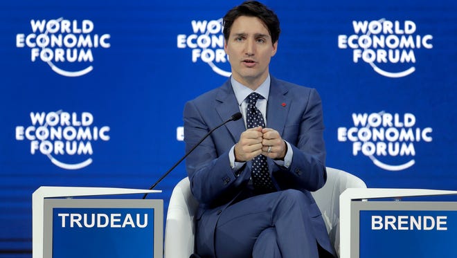 Justin Trudeau, Prime Minister of Canada, gestures during a conversation on corporate responsibility and the role of women in a changing world during the annual meeting of the World Economic Forum in Davos, Switzerland, on Jan. 23, 2018.