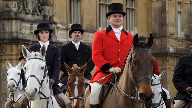 Michelle Dockery, left, and Hugh Bonneville, right, star in "Downton Abbey."