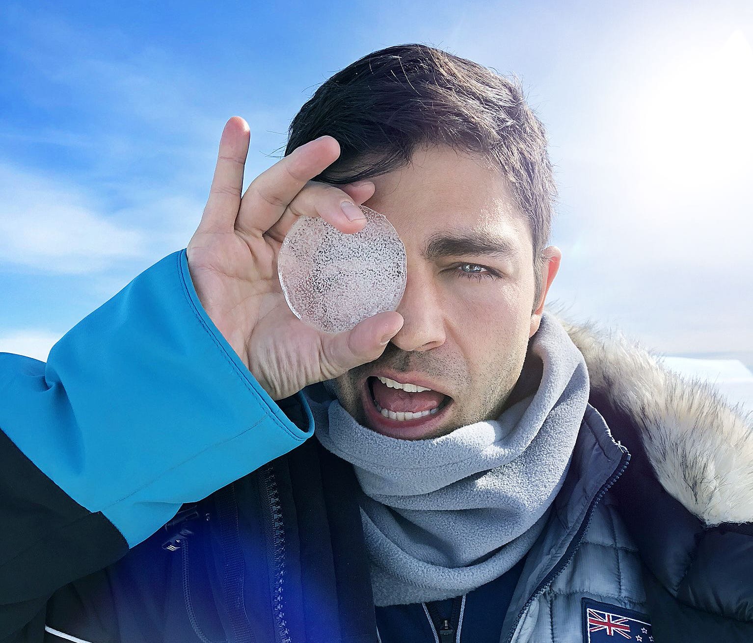 U.S. actor and environmentalist Adrian Grenier checks out an ice-core sample as part of a new Antarctica-focused safety video for Air New Zealand.