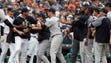 Aug. 24: Players from the Tigers and Yankees clear
