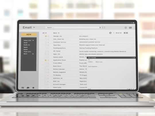 Email inbox up on laptop screen
