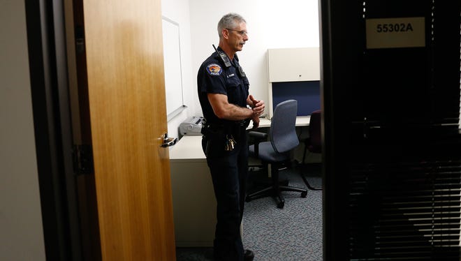 School Resource Officer Ron Paquin talks about the Farmington Police Department's new San Juan College substation Friday in the college's Health and Human Performance Center in Farmington.